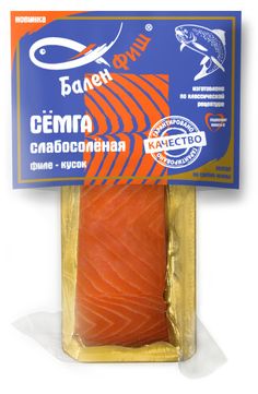 salmon fillet in a package on a white background with an orange stripe around the end