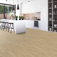 an open kitchen with white cabinets and wood flooring is shown in this rendering image