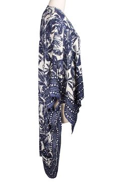 Whether you're going for a stroll under the sun or out for an evening, this ultra lightweight duster will radiate opulence. 26" L x 51" W Open front 3/4 length sleeves
 Side vents All-over print Woven 100% rayon Hand wash cold, line dry Imported Model stats: 5'10", 32" bust, 25" waist, 36" hip. White Printed Summer Outerwear, Summer Blue Floral Print Outerwear, Blue Floral Print Summer Outerwear, Bohemian Summer Outerwear With 3/4 Sleeves, Bohemian Outerwear With 3/4 Sleeves For Summer, White Summer Outerwear With 3/4 Sleeve, White 3/4 Sleeve Summer Outerwear, Summer Outerwear With 3/4 Sleeves, Summer 3/4 Sleeve Outerwear For Day Out