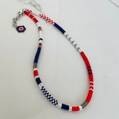 Herringbone rope necklace hand woven with red, navy blue, grey and white seed beads. This elegant herringbone rope necklace is a wonderful handmade jewelry, intricately hand-woven with a stunning combination of red, navy blue, grey and white seed beads. The bold and vibrant colors come together to create a striking piece that is sure to make a statement. Whether you're dressing up for a special occasion or adding a pop of color to your everyday look, this necklace is the perfect accessory to elevate any outfit. With its unique design and meticulous craftsmanship, this herringbone rope necklace is a beautiful addition to any jewelry collection. This beaded choker necklace is absolutely adorable!  The boho summer necklace will look wonderful on your neck. You will look elegant when you wear Boho Travel Outfit, Boho Travel, Trendy Chokers, White Choker, Trendy Necklace, Travel Outfits, Necklace Red, Summer Necklace, Trendy Necklaces