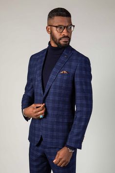 A blue and tan combination is a force to be reckoned with, and this Chigwell blazer is no exception. Featuring a timeless woven check in varying shades of blue and contrasting tan buttons, it makes for the perfect choice for your next formal event. Cut to a slim fit, it defines the torso to create a flattering silhouette and with a complimentary pocket square you'll always look presentable. Model wears size 38R. Features Slim fit Fully lined Single-breasted Peak lapel Single back vent Four butto Blue Tweed Jacket For Business Casual, Blue Tweed Jacket For Semi-formal Occasions, Semi-formal Blue Tweed Jacket, Blue Tweed Blazer For Business, Blue Tweed Blazer With Notch Lapel, Blue Tweed Jacket With Suit Collar For Business Casual, Business Plaid Tweed Jacket, Tailored Blue Tweed Blazer, Blue Tweed Tailored Blazer