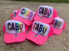 Cabo Beaches Trucker Hat Neon Pink Snap Back Pink Fun Sun Hat For Beach Season, Cute Pink Beach Sun Hat, Cute Pink Sun Hat For Beach Season, Playful Summer Party Hat, Pink Sun Hat For Beach Festival, Casual Mini Hats For Summer Party, Playful Mini Hats For Summer Party, Cute Summer Party Hats, Casual Summer Mini Hats For Party