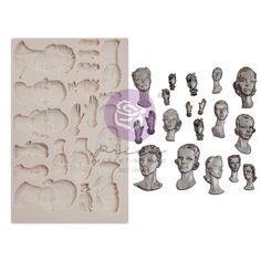 a cookie sheet with many heads and hands in the shape of women's heads