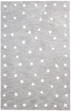 a gray rug with white stars on it