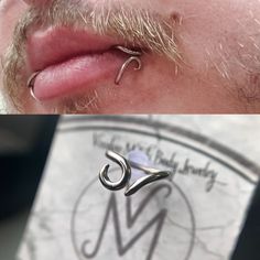 a man with some piercings on his nose and an image of the same person's nose