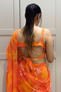 Yellow and orange tiered ruffled saree skirt with floral garden print all over. Paired with a matching printed padded blouse and draped ruffled dupatta. - Aza Fashions Saree Skirt, Ruffled Saree, Ruffle Sarees, Ruffle Saree, Padded Blouse, Drape Saree, Garden Print, Fashion App, Floral Garden