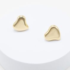 our Crazy On You Studs are an essential addition to any wardrobe. these elegant yet whimsical earrings will add brilliance and a hint of playfulness to any ensemble, day or night. 18k gold or rhodium pvd over 316L stainless steel 19.5mm x 20mm post sits at center of earring lightweight Modern Gold Hypoallergenic Plug Earrings, Elegant Stainless Steel Heart Earrings, Gold Heart Earrings Modern Style, Modern Gold Heart Earrings For Pierced Ears, Modern Gold Heart Earrings For Anniversary, Trendy Yellow Gold Stainless Steel Earrings, Trendy Polished Finish Earrings For Gift, Yellow Gold Stainless Steel Earrings For Gift, Modern Gold Heart-shaped Earrings