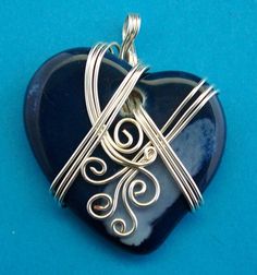 Wire Wrapped Blue Ceramic Heart Pendant Style by MontourDesigns Hand Wrapped Heart Pendant Jewelry Gift, Artistic Heart-shaped Sterling Silver Jewelry, Artistic Handmade Heart-shaped Jewelry, Blue Wire Wrapped Jewelry For Crafting, Unique Wire Wrapped Heart Pendant Jewelry, Unique Heart-shaped Wire Wrapped Necklace, Unique Handmade Open Heart Jewelry, Wire Wrapped Heart Pendant Jewelry Gift, Bohemian Wire Wrapped Heart Pendant Jewelry