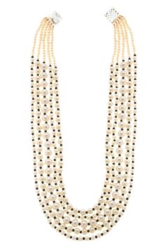 Black-White Gold Tone Beaded Necklace.Elegant and modern,White beaded necklace will complete your lavish ensemble grandeur. Necklace Size - 24 inches. Closure - Adjustable Style Tip - We love teaming this with classy chiffon sarees or zari silk sarees. Also looks best when worn with your royal whites, off whites and gold. We recommend styling with pastel solids or floral dresses in peachy pink, pistachio green and pastel blue too. Handcrafted in Jammu and Kashmir Paisley Pop travels the depths o Traditional White Beaded Necklace For Formal Occasions, Traditional White Beaded Necklace For Formal Events, Traditional White Beaded Formal Necklace, Elegant Black Beads Necklace For Festive Occasions, White Pearl Long Necklace With Gemstone Beads, Elegant White Beads With Pearl Chain, Festive White Pearl Necklace With Polished Beads, Elegant Multi-strand Festive Beads, White Pearl Jewelry With Black Beads