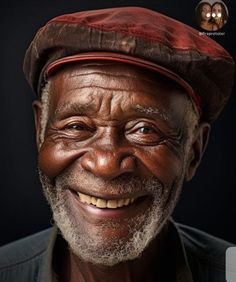 an older man wearing a red hat and smiling at the camera with his eyes wide open