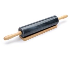 a rolling pin with wooden handles on a white background