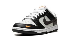 The Nike Dunk Low “Mini Swoosh - Black/Total Orange” is a colorway of the retro basketball shoe with an easy-to-wear style.  The upper is complete with a white tumbled leather base and black leather overlays.  A black tumbled leather Swoosh logo appears on the mid-panel and a small Total Orange-colored Swoosh is embroidered on the lateral side of the forefoot.  “Nike” branding is embroidered in black lettering on the heel and printed on the tongue tag.  Underfoot, a white midsole and black outso Orange Dunks, Retro Basketball Shoes, Nike Branding, Retro Basketball, Orange Shoes, Cute Nike Shoes, Nike Brand, Cute Nikes, Stadium Goods