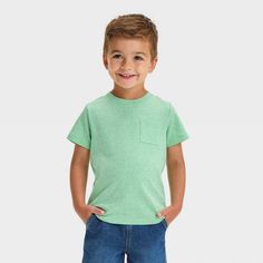 Bring classic style to your little one's collection of tees with this Short-Sleeve Pocket T-Shirt from Cat & Jack™. Crafted from midweight jersey fabric, this short-sleeve T-shirt brings cool comfort to their day, while the below-hip length gives them the option of wearing it tucked in or untucked. Designed in a solid hue with a chest patch pocket, this crewneck tee makes a great pairing with different shorts, leggings or pants for versatile outfit options. Cat & Jack™: Designed for all children Outfit Options, Versatile Outfits, Toddler Boy Outfits, Fabric Tape, Hem Style, Boys Long Sleeve, Pocket Tshirt, Knitted Tshirt, Pair Of Pants