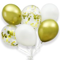 gold and white balloons with confetti on them