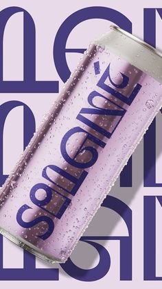 a can of soda with water droplets on the side and purple lettering that reads, corona