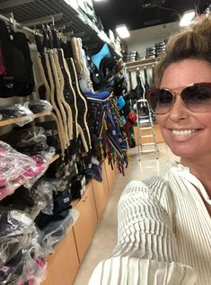 a woman wearing sunglasses in a store