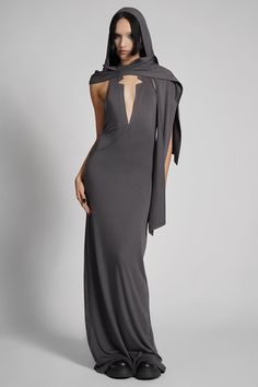 Make them take a second glance. Maxi dress made from luxuriously dense Jersey, featuring an add-on hood that can be draped across the shoulders and over the crown of the head, with plunging halter top neckline. FIT NOTES:Tatianna wears a size Small, 5'9, with a 26" waist. MATERIALS:95% rayon 5% spandexMade in China Glamour Spell, Spy Outfit, Dress With Hood, Top Neckline, Hooded Dress, Steel Grey, Color Khaki, The Crown, Casual Outfit