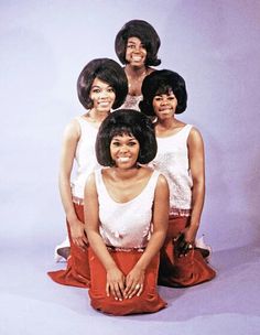 the supremes are posing for a portrait together