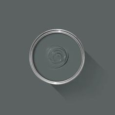 an empty tin can on a gray background