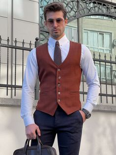 NEW COLLECTİON - FW / 23Collection: Fall / Winter - 23Production: Private Collection Slim-fit Wool Tile Men’s WaistcoatProduct color: TİLEProduct material: %50 Cotton , %50 Polyester Product details: The waistcoat is adjustable from the back.Product care: Dry clean onlyProduct size: 46-48-50-52-54-56Package İncluded : Waistcoat Dimensions of the mannequin: 185cm / 78kg , Size : 50EU / 40US Slim Fit Brown Outerwear For Work, Brown Slim Fit Outerwear For Work, Modern Fitted Suits For Fall, Modern Fitted Vest For Formal Occasions, Modern Fitted Fall Suit, Notch Lapel Business Vest For Fall, Business Vest With Welt Pockets For Fall, Fitted Vest For Semi-formal Fall Occasions, Brown Business Vest With Notch Lapel