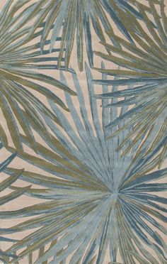 a rug with palm leaves on it in blue and green colors, all over a beige background