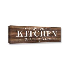 a wooden sign that says kitchen the heart of the home