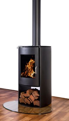 Elevate your home with the Nectre-N65 Freestanding Wood Stove. Experience efficient heating and timeless design in one powerful package. Paint Steel Door, Wood Burner Stove, Wood Heater, Curved Wood, Wood Fireplace, Wood Burner, Wood Storage, Wood Burning Stove, Steel Doors