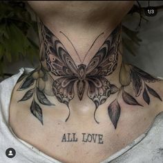 a woman's neck with an all love butterfly tattoo on the top and bottom