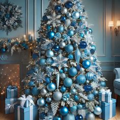 a christmas tree with blue and silver ornaments