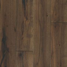 an image of wood flooring that looks like it has been painted in dark brown