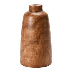 a wooden vase sitting on top of a white surface