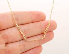 This is a tiny names necklace with 1, 2, 3, 4 pendants and chain spaces between names. I make this mom necklace in 18K yellow gold, 18K rose gold, 18K white gold, with a cable chain. Different chain lengths are available. I could add a diamond or a birthstone to the necklace - contact me. (Diamond - $45 ea, colored birthstone $15) Each name is 0.6-1 inch wide and about 0.14 in tall, with 1.6mm thickness (15-20mm wide and 4mm tall). The size estimate is for names with 4-8 characters. This is a cu Elegant Yellow Gold Jewelry With Names, Dainty Yellow Gold Name Necklace For Personalized Gift, Gold Necklace With Names For Mom, Custom Yellow Gold Nameplate Necklace For Mother's Day, Yellow Gold Custom Nameplate Necklace For Mother's Day, Personalized Name Necklace In Yellow Gold, Personalized Yellow Gold Necklace With Names, Personalized Delicate Yellow Gold Name Necklace, Mother's Day Custom Yellow Gold Nameplate Necklace