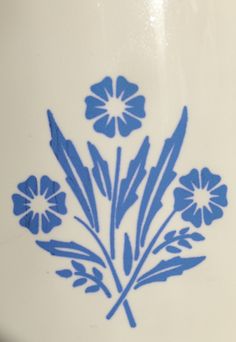 a blue and white flower design is on the side of a bag