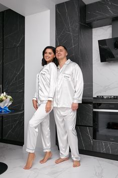 Groom and Bride Long Sleeves Top+ Pants, Honeymoon present, Gift for Her, Gift for him, Pajamas for Groom Bride, Valentines Days Gift L+LIf you want to create matching PJs for the whole family, for bride & groom, customized PJs for your bridesmaids or just as a gift, you're in the right place.Browse our selection of men, women and kids PJs choose your color and design and enjoy the feeling.Set Includes - Long Sleeve Shirt & Pants Perfect Gift for any occasion : Valentines Day Gift , Anniversary White Long Pants Sleepwear For Home, Comfortable White Sleepwear Pants, White Long Pants Set For Sleepovers, White Long Pants Sets For Bedtime, White Pajama Party Sets With Long Pants, White Long Pants Pajama Party Sets, White Long Pants Sets For Pajama Party, Matching Satin Pajamas, Satin Pajamas Set