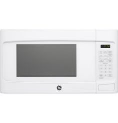 a white microwave oven with the door open