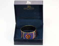 Limited Edition FreyWille Hommage a Hundertwasser “Spiral of Life” Diva 24K gold plated enamel bracelet in good condition, with some scratches on the enamel (please see last pictures). Approximate Measurements:Diameter 2.5”, Width 1.35” (best suitable for small/medium wrist). Comes with box. Made in Austria. Designer Enamel Jewelry As A Gift, Designer Enamel Jewelry For Gift, Luxury Enamel Cuff Bracelet Gift, Luxury Enamel Bangle As Gift, Luxury Enamel Bangle For Gift, Designer Black Enamel Bracelets, Designer Black Enamel Bracelets As Gift, Designer Black Enamel Bracelets For Gift, Modernist Enamel Jewelry For Gifts