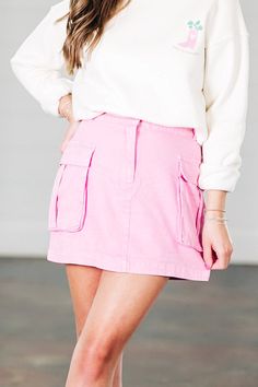 Mineral wash cargo mini skirt -non-sheer -lightweight -Fabric content - 100% cotton -Machine wash cold / Tumble dry low -Colors may vary from different viewing devices. Pink Mini Skirt With Pockets For Spring, Spring Pink Mini Skirt With Pockets, Trendy Mini Cotton Bottoms, Utility Style Cotton Mini Cargo Skirt, Utility Style Cotton Cargo Mini Skirt, Pink Mini Denim Skirt With Pockets, Pink Denim Mini Skirt With Pockets, Summer Pink Mini Skirt With Pockets, Cotton Mini Skirt With Cargo Pockets