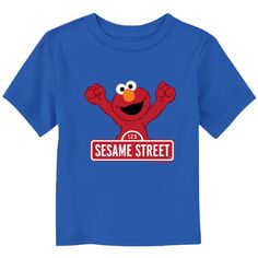 We can tell you how to get to Sesame Street and look good doing it, with these adorable designs for the whole family from the iconic, long-running children's series Sesame Street! Step onto Sesame Street with this officially licensed Toddlers' Classic Red Logo Sign Elmo Graphic T-Shirt featuring the adorable Elmo raising his arms in celebration and the classic Sesame Street sign in white and red style. Bring joy and laughter to your kids' day with this new Sesame Street apparel! Sesame Street Sign, Sesame Street Signs, Street Apparel, Tv Clothes, Trending Graphic Tees, The Young Ones, Sleeve Packaging, Street Sign, Graphic Tee Design