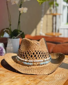 Presenting our Custom Coastal Cowgirl Bridal Hat, the perfect accessory for brides to celebrate their love story in style. Designed with two elegant bands, this personalized straw cowboy hat is ideal for wearing on your honeymoon or at a coastal cowgirl-themed bachelorette party. This custom bridal hat allows you to personalize with your new last name and wedding date, creating a unique keepsake of your special day. The bands are adorned with aquamarine chip beads, offering the perfect 'somethin Cowgirl Hat Bachelorette Party, Coastal Cowgirl Bride, Straw Cowboy Hat Decorating Ideas, Coastal Cowboy Wedding, Decorating Cowboy Hats, Coastal Cowboy Hat, Coastal Cowgirl Wedding, Beaded Cowboy Hat, Coastal Cowgirl Hat