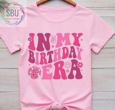 a pink shirt with the words in my birthday era on it