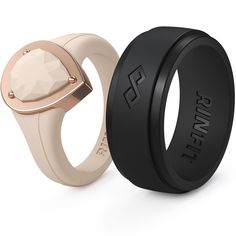 two wedding rings, one black and one rose gold