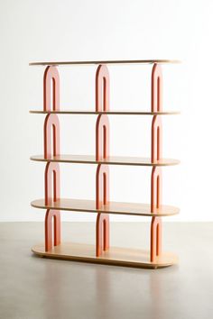 a wooden shelf with four shelves on each side and three red bars at the top