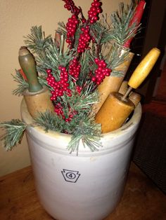 a potted plant sitting on top of a table filled with different types of items