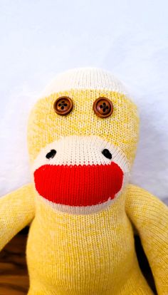 Quirky little sock duck is one of a kind. This "ugly duckling" will flap right into your arms for a snuggle. Handmade with soft black yarn detailing, brown wooden button eyes, cuddly wings, and webbed feet. This stuffed sock animal is a great idea for a birthday present, gift, or treat just for you. That is what's so great with this duck, it's for everyone. This item was made with care to detail and uniqueness.  Only 1 available! Click add to cart before its gone! BUTTONS MAY POSE A CHOKING HAZARD, not recommended for children under three. Surface clean only. Into Your Arms, Yellow Socks, Button Eyes, Ugly Duckling, Sock Animals, Present Gift, Birthday Present, Soft Black, Birthday Presents