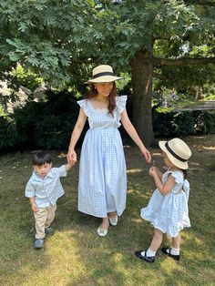 Handmade with love from a mother of two children.  Let's collect beautiful moments together with this matching dress.  Mother and Daughter and Son Mama Bella Blue Gingham Dress is a full skirt tie back with lace trim embroidery and a ruffled straps top off the soft shape of this midi dress. A perfect dress for everyday look or even a special occasion.  FIT: One Size (Chest 34-39 inches. Waist 25-34 inches. Length from waist 32 inches.) Materials and Care : 100% cotton, Lined.   Machine wash cold Family Matching Summer Dresses, Blue Matching Set Dress For Spring, Dress Mother And Daughter, Mommy Son Outfits, Collect Beautiful Moments, Son Outfits, Trim Embroidery, Mommy Son, Dress For Everyday