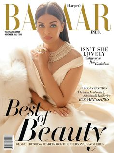 a woman in a white dress on the cover of a magazine