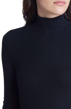 Cut from soft, microribbed fabric, this closet-staple mock-neck top looks fantastic as part of your cool-weather layering strategy or starring on its own. 23 1/2" Length ( size medium) Mock neck Long sleeves 96% modal, 4% Elastane Machine wash, tumble dry Made in Peru Closet Staples, Mock Neck Top, Mock Neck, Peru, Layering, Turtle Neck, Nordstrom, Long Sleeves, Size Medium