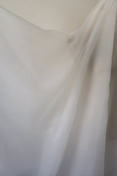 @Favorite shop & get coupons in Announcement #here https://www.etsy.com/shop/lacefabricsupplier organza fabric by the yard, thick organza fabric garment accessories ### The price is for 1 yard, you can buy as many yards as you like by adding the quantity when place orders. ### Color: ivory white as seen from the pictures ### Size: The fixed width is 150cm. Wholesale price is available, please leave messages to us.