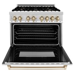 a white stove with gold knobs and an oven door on the front, side by side