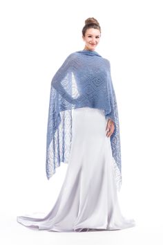 "Feminine, versatile and luxurious, this knitted shawl exudes timeless elegance. Featuring a textured body and adorned with scalloped borders, this shawl allows for infinite styling possibilities. A hit with brides and bridesmaids, the shawl is a marvelous special occasion accessory but also perfectly lovely for casual wear. Dimension: 24″ X 88″ 20% silk 80% acrylic Light weight buttery soft Handmade in USA Model in the photos is 5'10\" tall with bust 33\" and wears US women dress size 2. Dry cl Elegant Hand-knitted Shawl Scarf, Elegant Hand Knitted Shawl Scarf, Elegant Knitted Shawl Scarf, Mens Knitted Scarf, Dusty Blue Bridesmaid, Evening Wrap, Bridesmaid Shawl, Evening Wraps, Evening Shawls